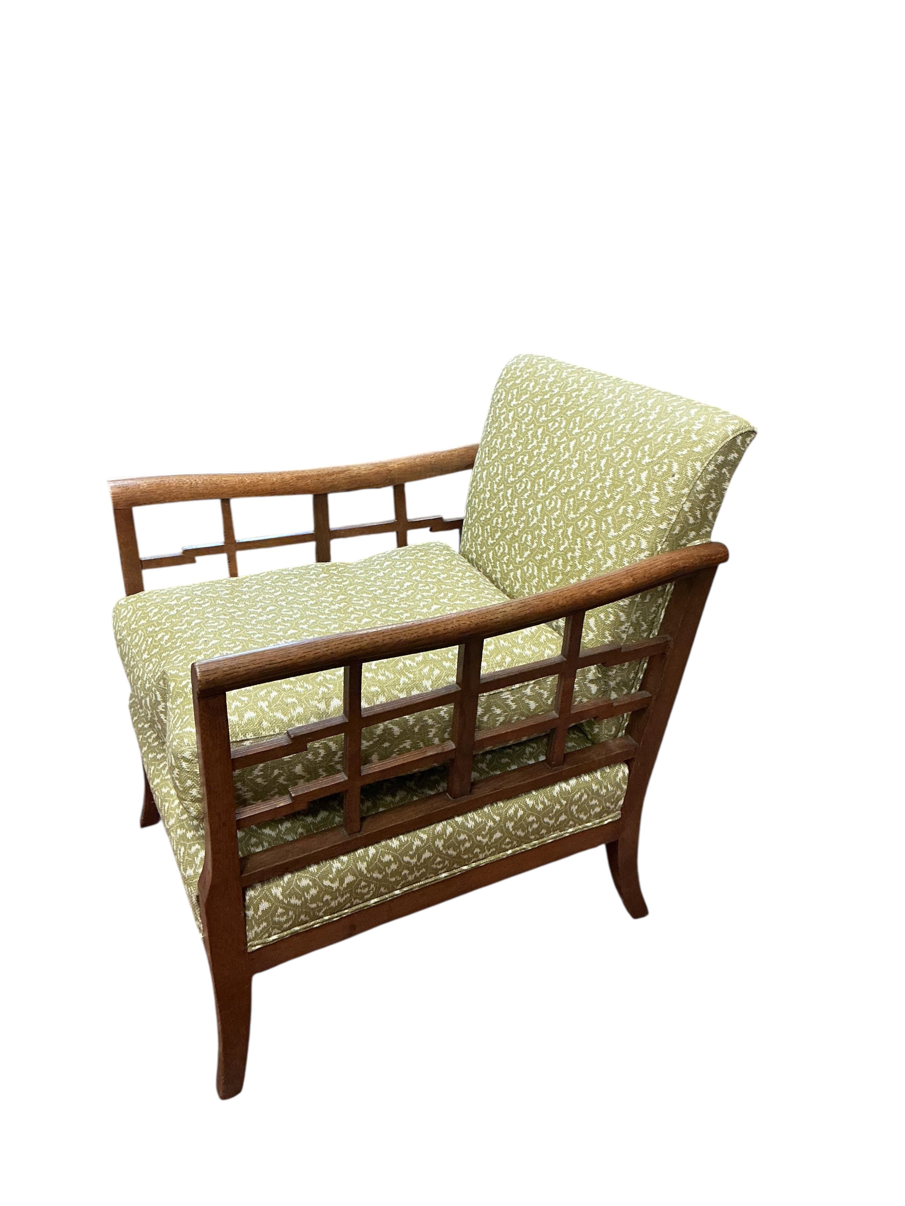 A 1920's oak framed armchair, width 72cm, depth 74cm, height 78cm
